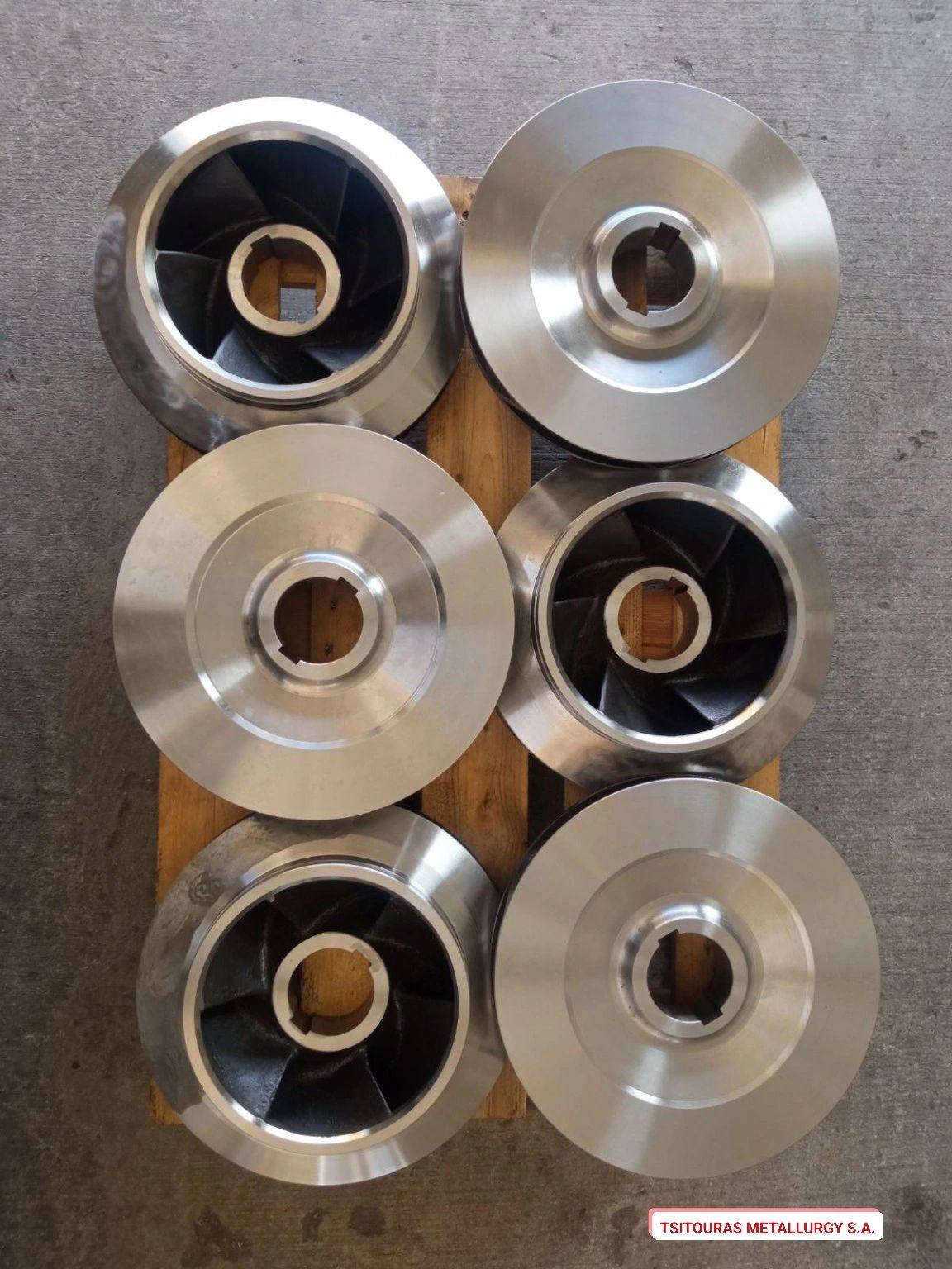 Six machined stainless impellers ready to ship